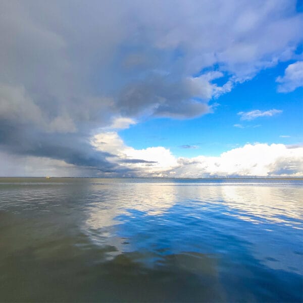 Nach dem Sturm – Leinwandbild mit dramatischem Himmel über dem Meer
